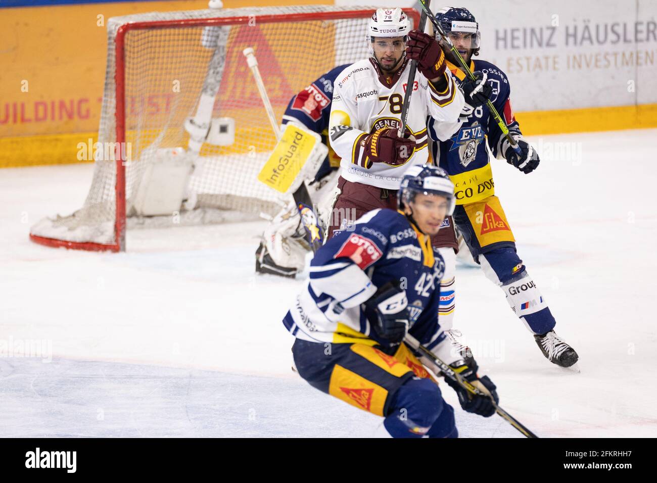 Zug, Schweiz. 03rd May, 2021. 03.05.2021, Zug, Bosshard Arena, NL Final -  Game 1: EV Zug - Servette HC, #78 Stephane Patry (Genf) fighting in the slot  with #18 Dominik Schlumpf (Zug) (