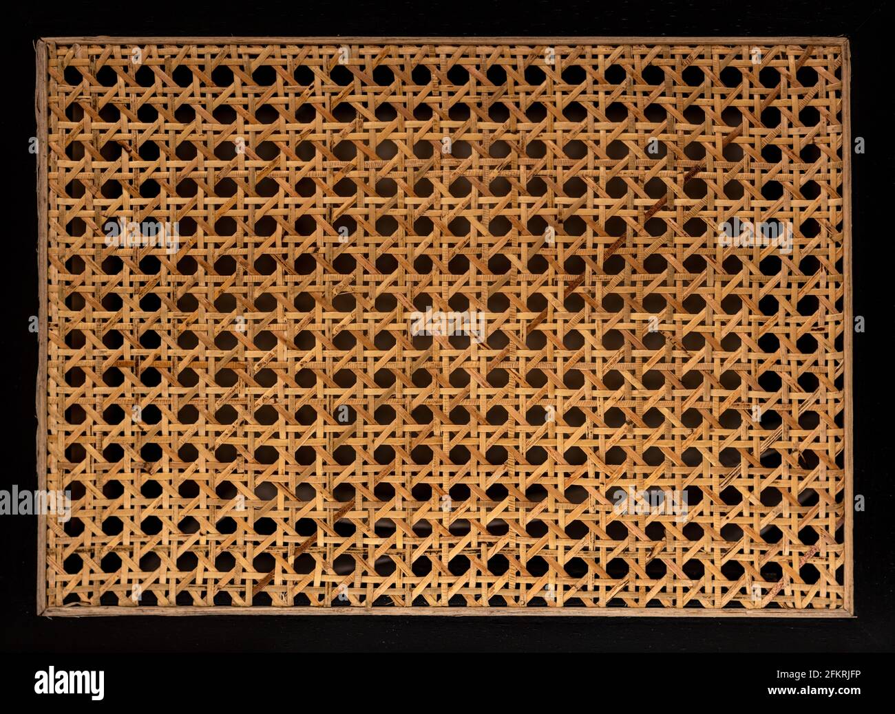 Hexagonal weaving from rattan texture Stock Photo