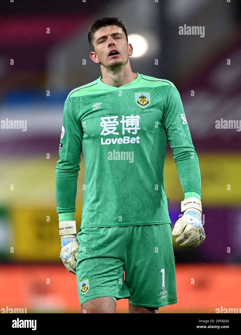 Burnley goalkeeper Nick Pope dejected after a missed chance during the Premier League match at Tuff Moor, Burnley. Issue date: Monday May 3, 2021. Stock Photo