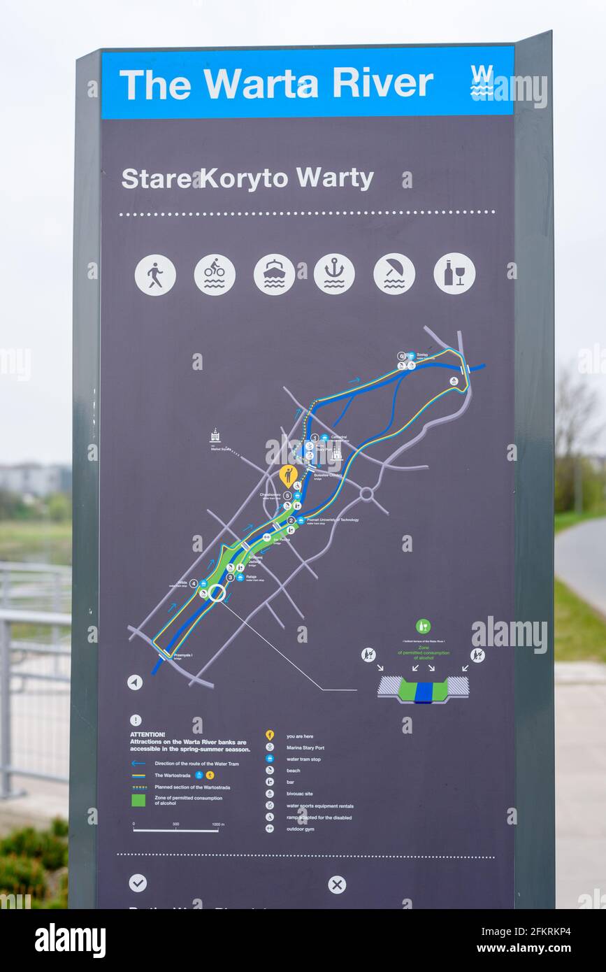 Poznan, wielkopolskie, Poland, 01.05.2021: The Warta River information board sign by a sidewalk Stock Photo