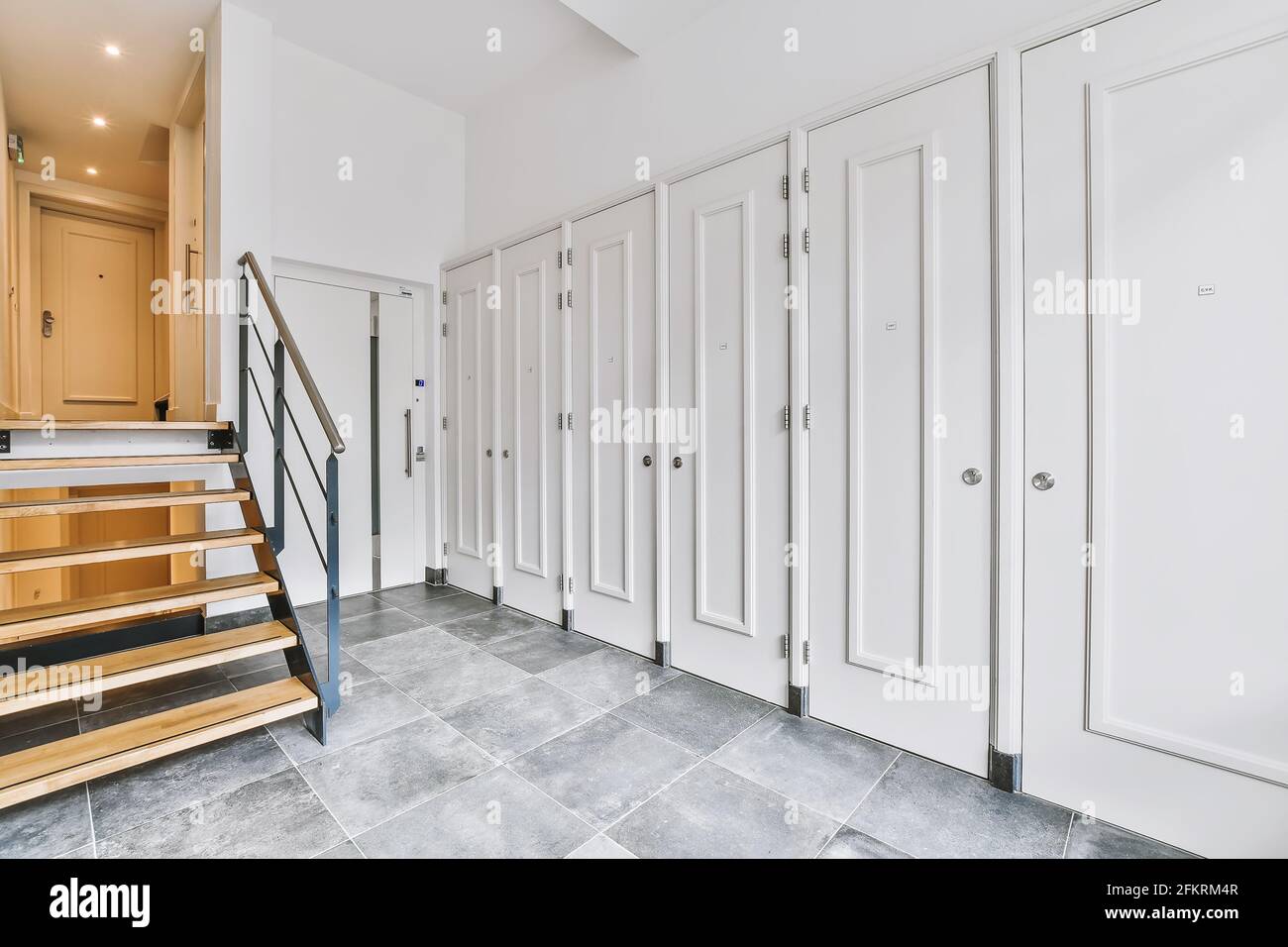 Doors and staircase in modern hall Stock Photo