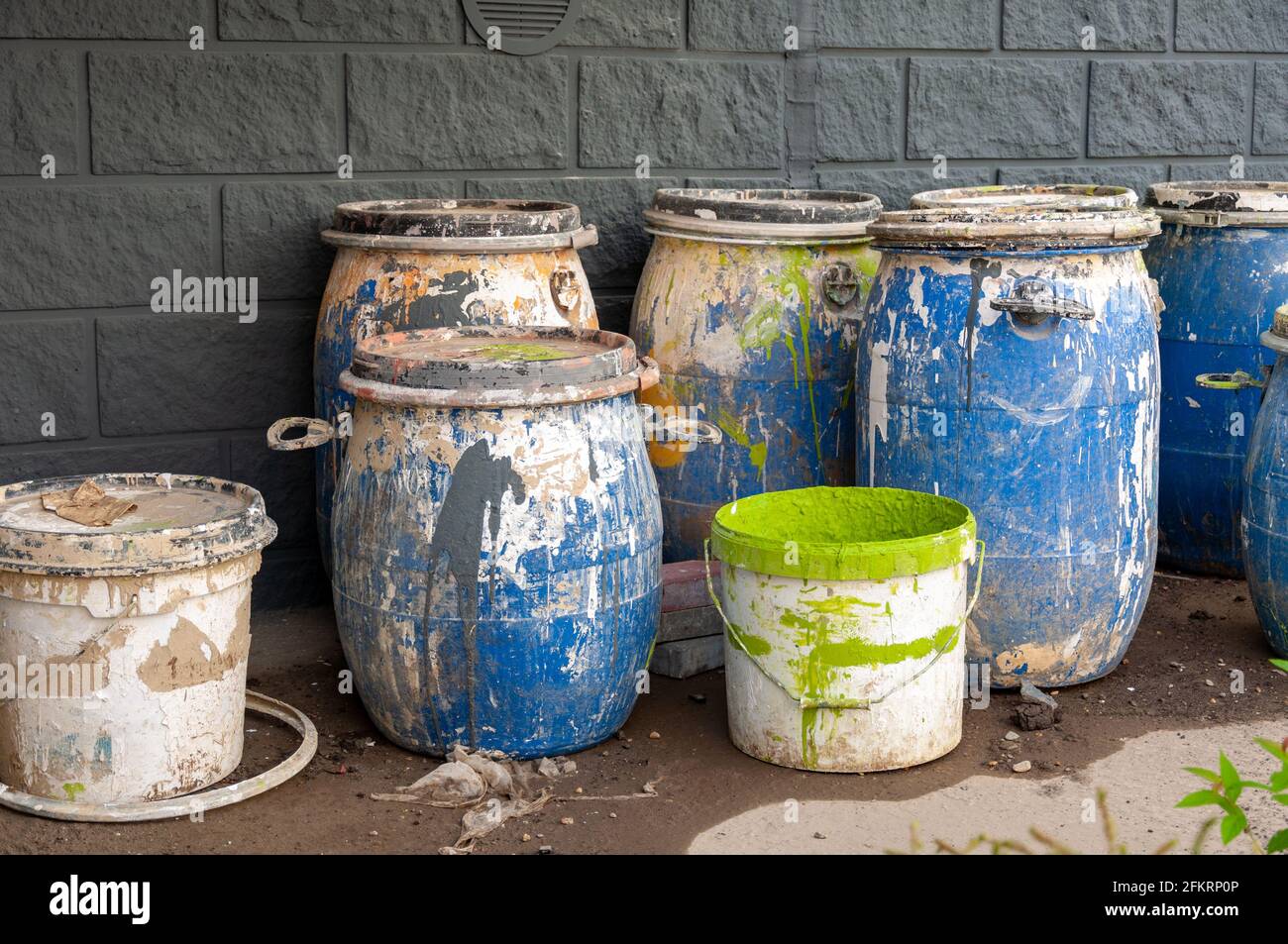 Industrial Waste, Plastic barrels of paint. High Angle View Of Liquids