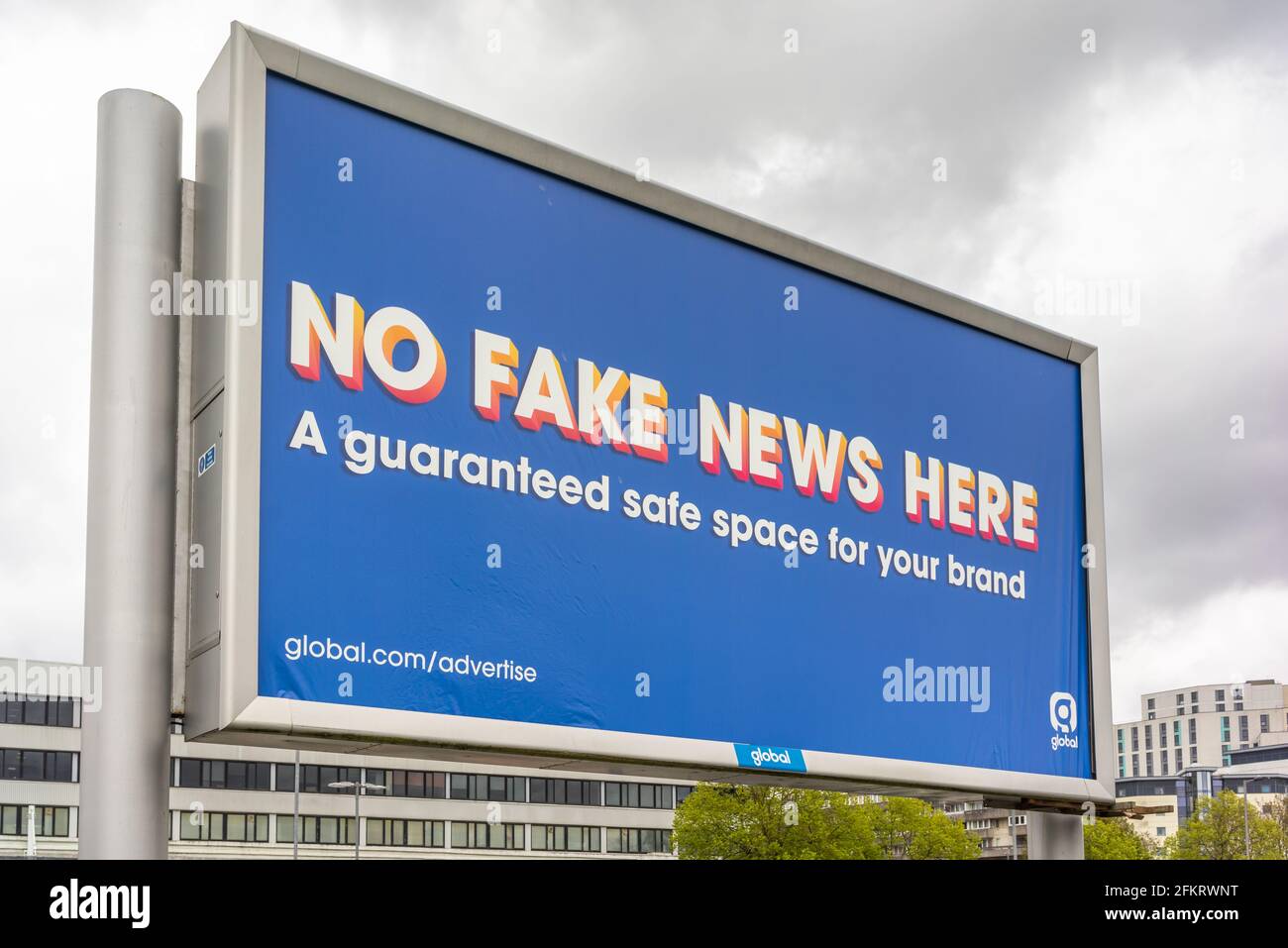 No more fake news here- global Advertising Billboard, England, UK Stock Photo