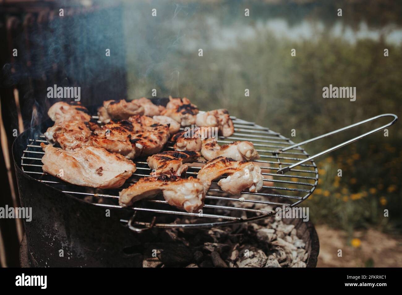 Closeup shot of meat roasting on a charcoal grill Stock Photo - Alamy