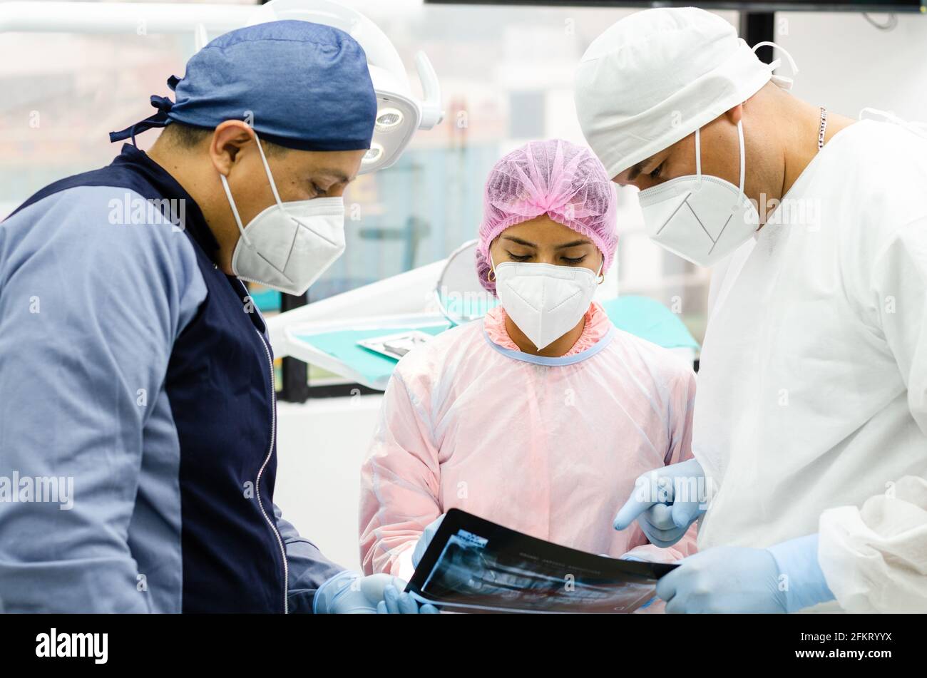 Doctors with protective suit to combat Covid-19, Coronavirus. Stock Photo