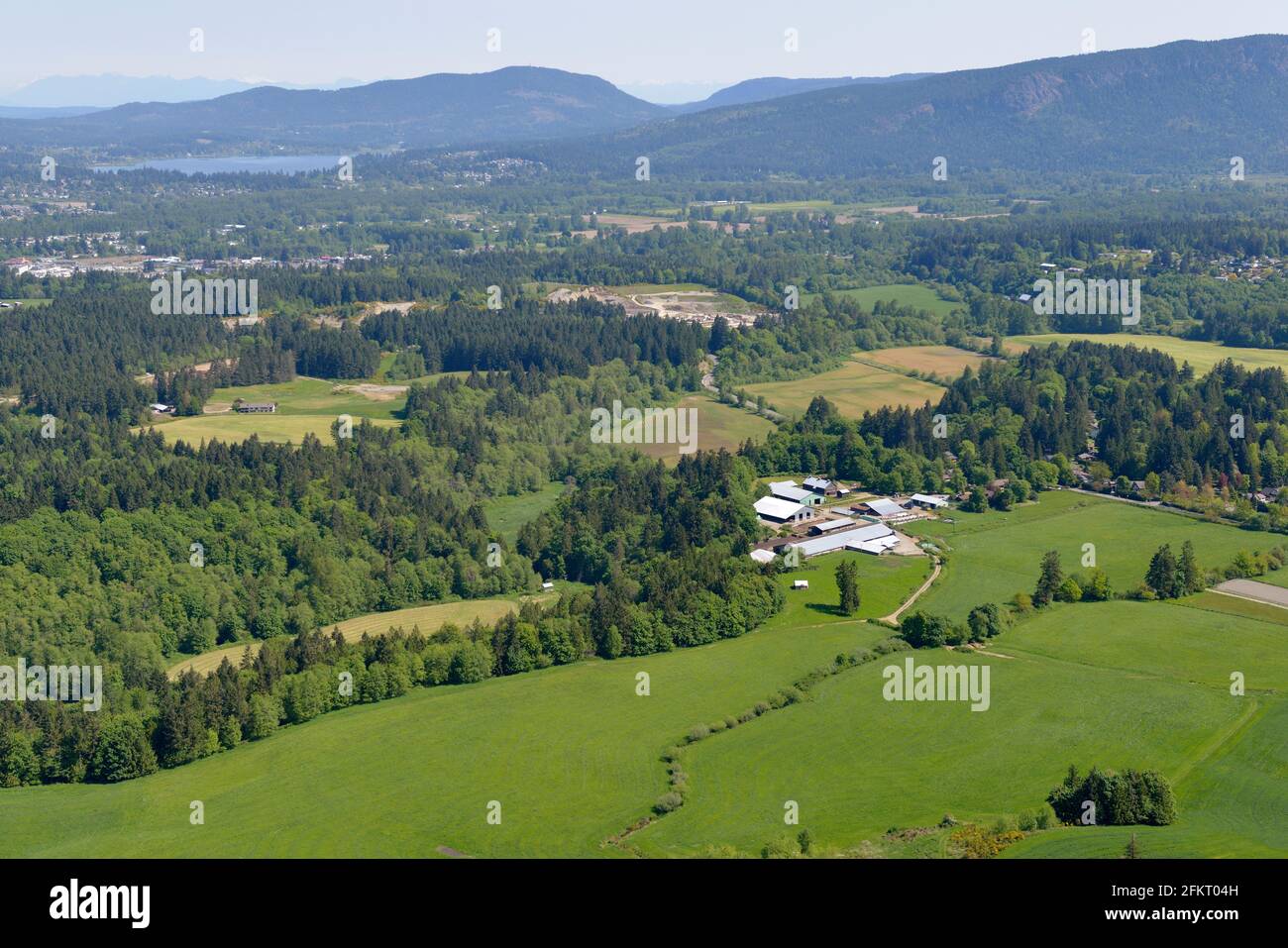 Aerial photo of a farm on Fairbridge area, Cowichan Valley, Vancouver Island, British Columbia, Canada. Stock Photo