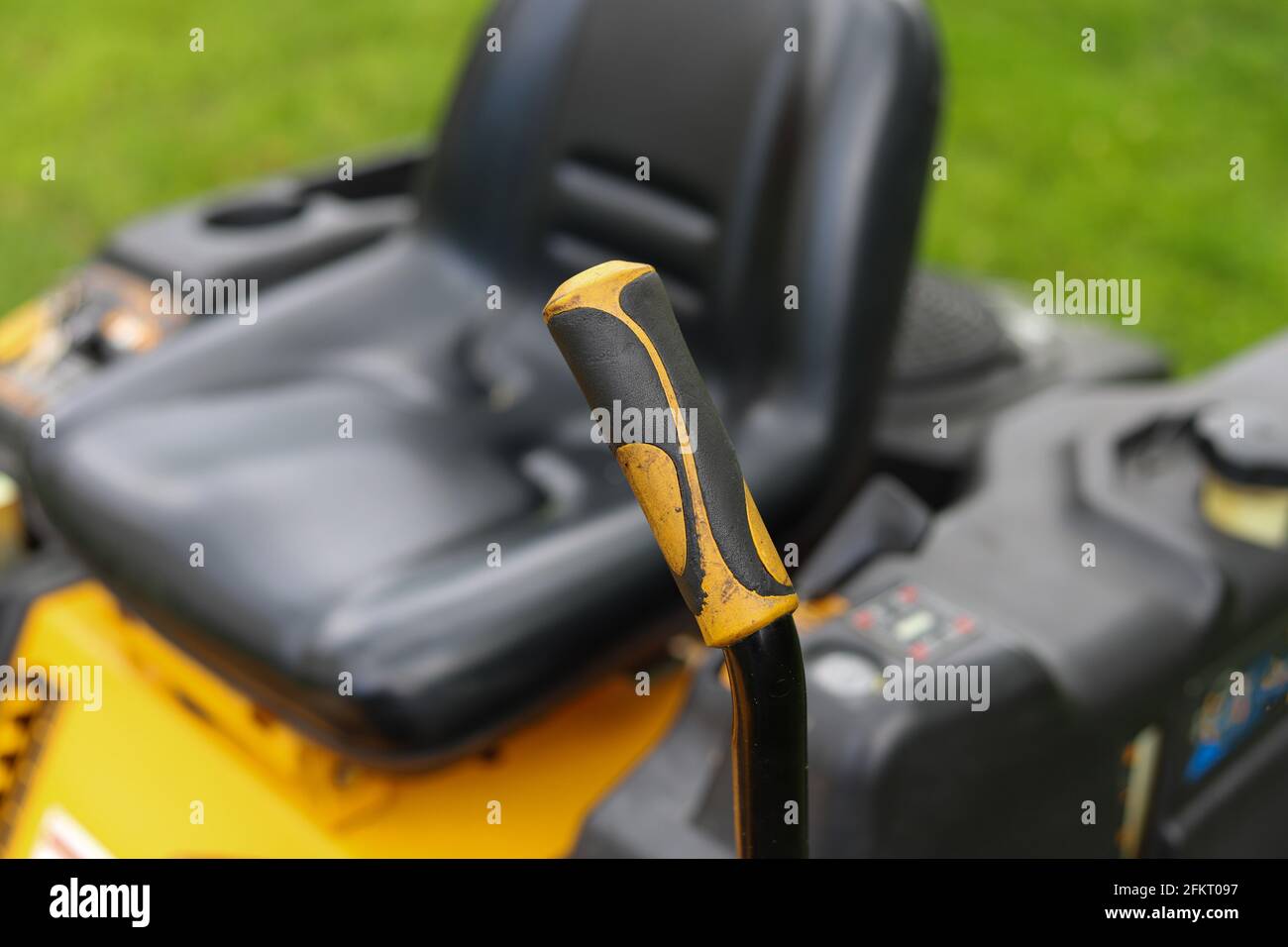 A close up of a handle on a lawn mower Stock Photo