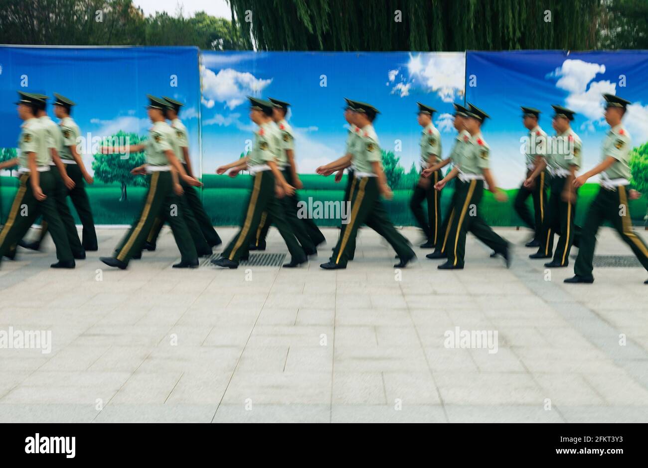 Policemen walking in Tiananman Square Stock Photo