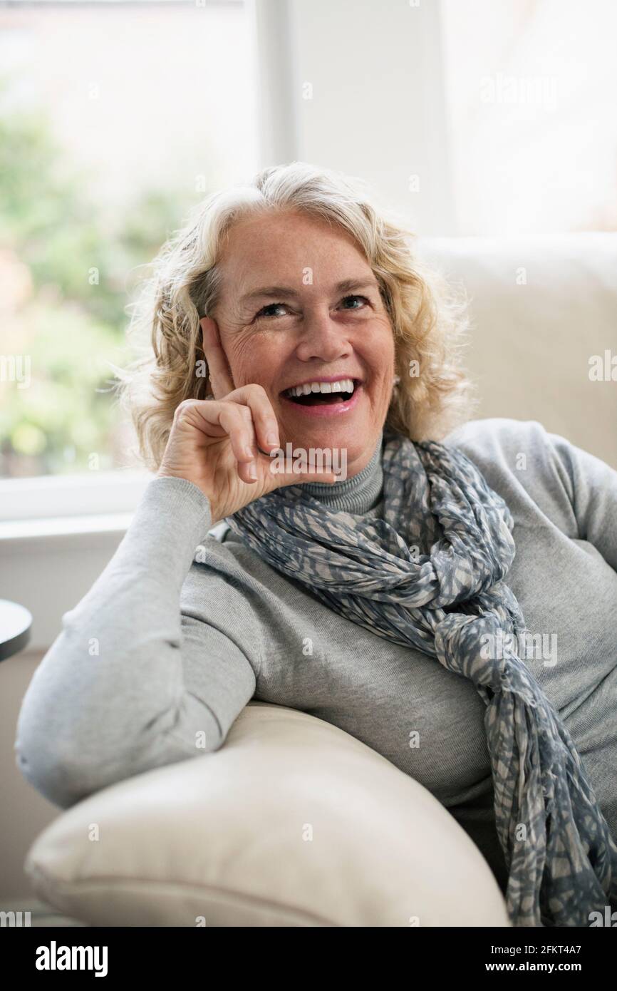 Lifestyle woman on sofa luxury hi-res stock photography and images - Alamy