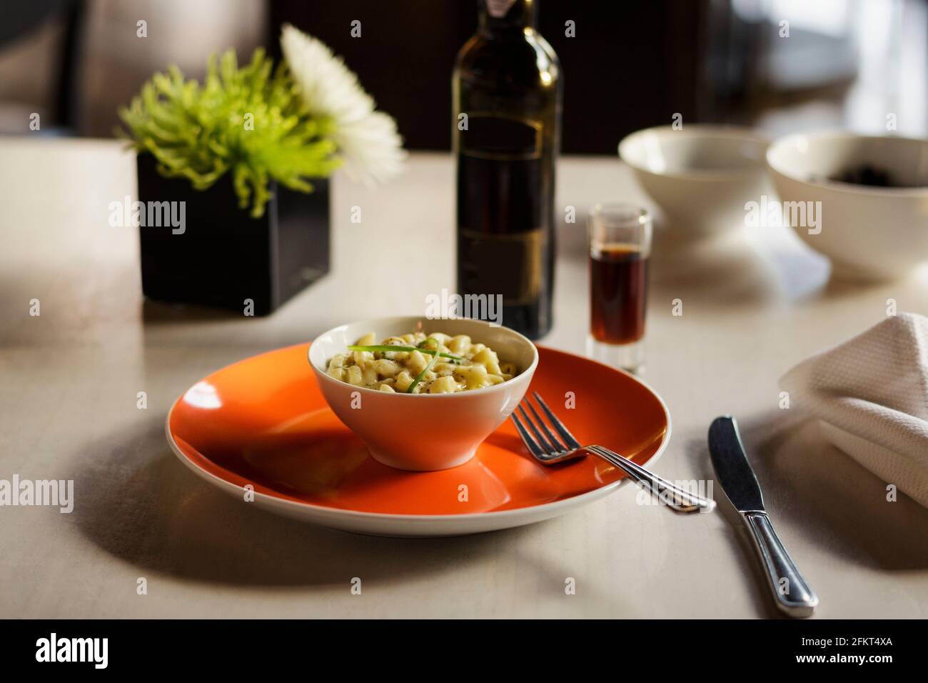 Macaroni cheese meal with wine pairing Stock Photo Alamy
