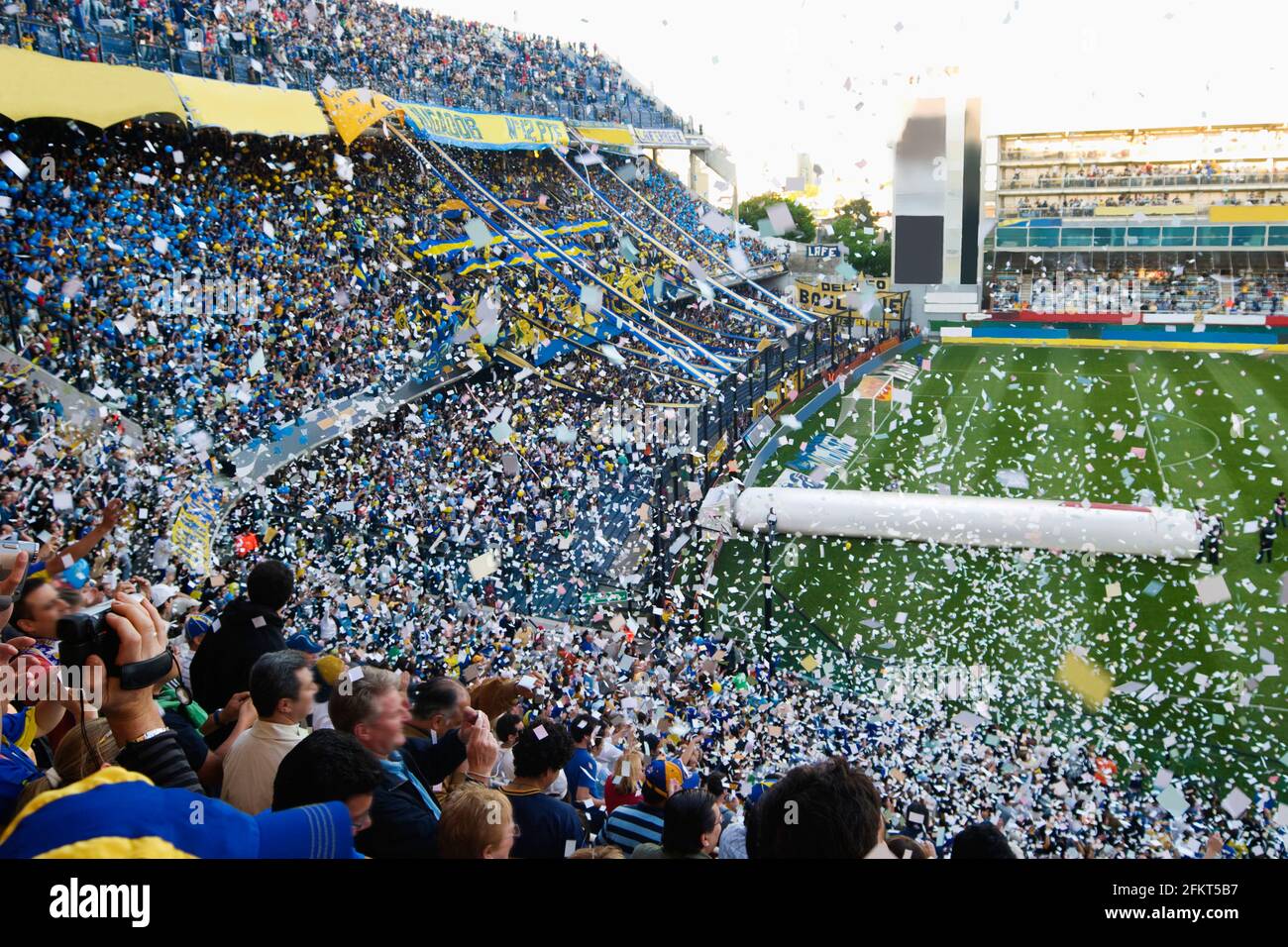 Crowds cheering Boca Juniors in the Estadio Alberto J. Armando, La Bombonera, La Boca, Buenos Aires, Argentina Stock Photo