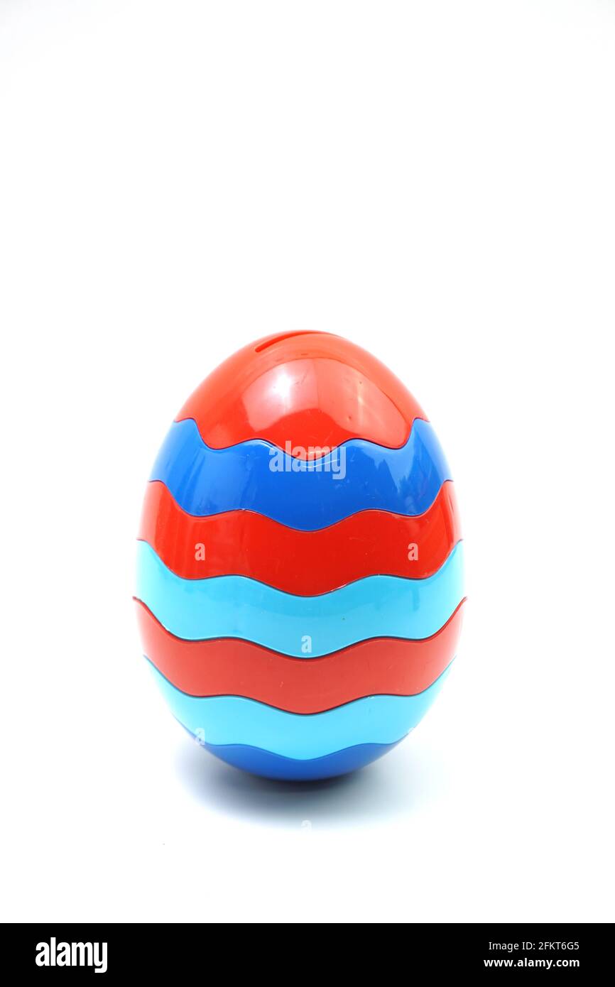 Colorful plastic egg isolated on white background Stock Photo