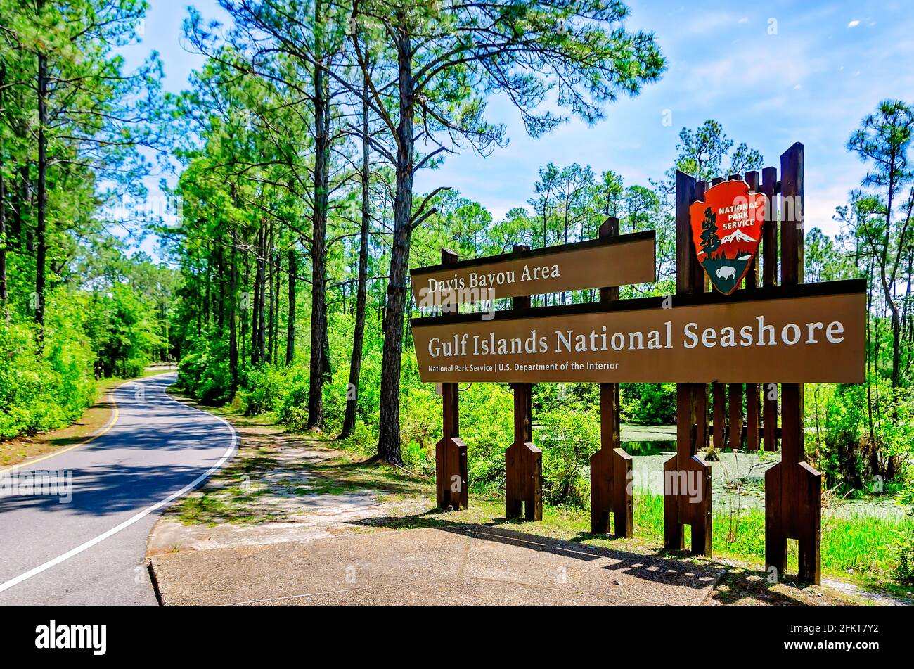 A sign stands at the entrance to the Davis Bayou Area of Gulf Islands National Seashore, May 1, 2021, in Ocean Springs, Mississippi. Stock Photo