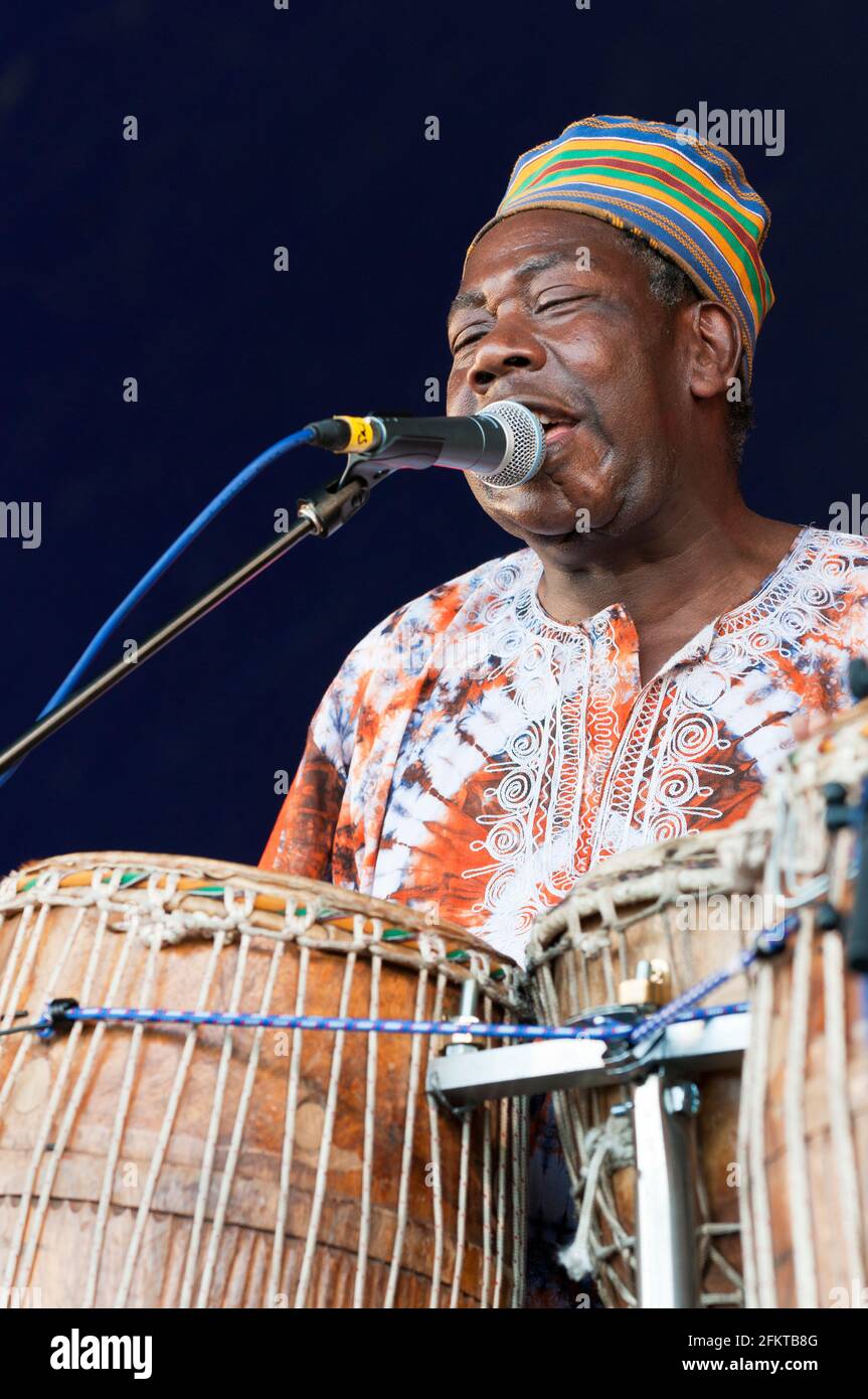 Ben Baddoo, Master Drummer and Dancer from Ghana performing with Baraka at the Wychwood festival, UK. June 10, 2012 Stock Photo