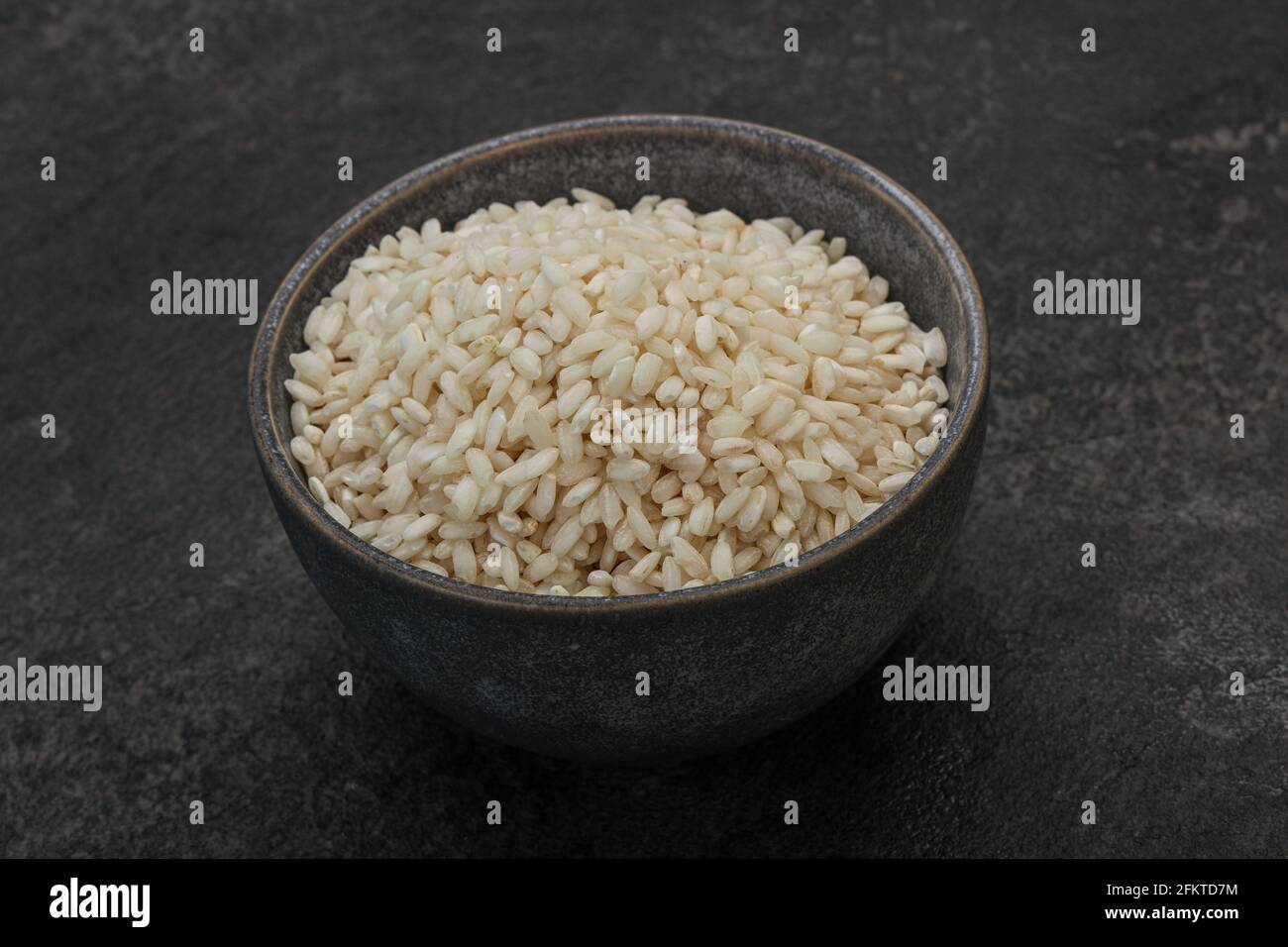 Raw Italian arborio rice for Risotto Stock Photo - Alamy