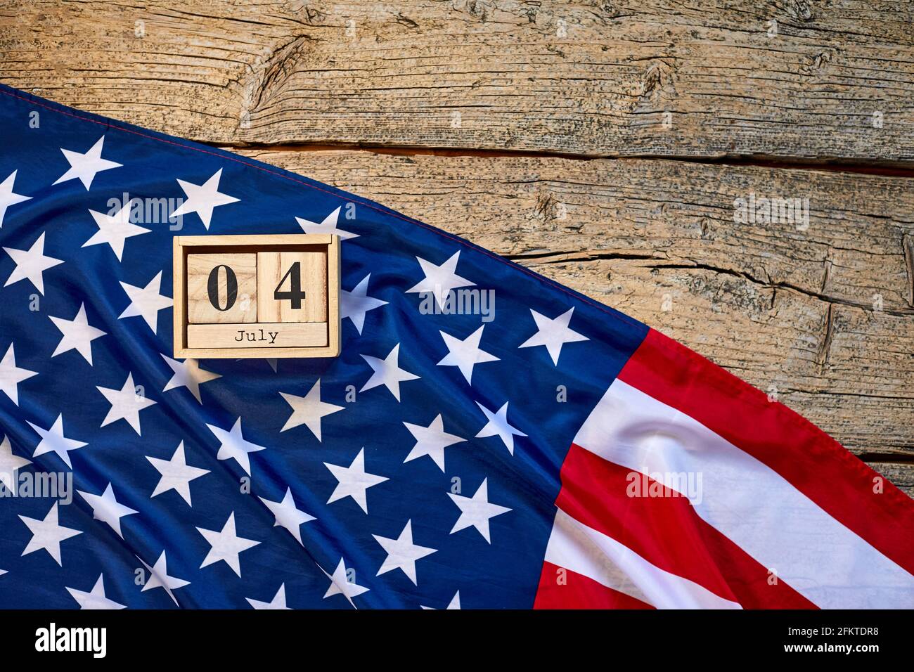 Wooden calendar with date on the background of the USA flag. Template for  writing the dates of the national holidays of America with free text space  Stock Photo - Alamy