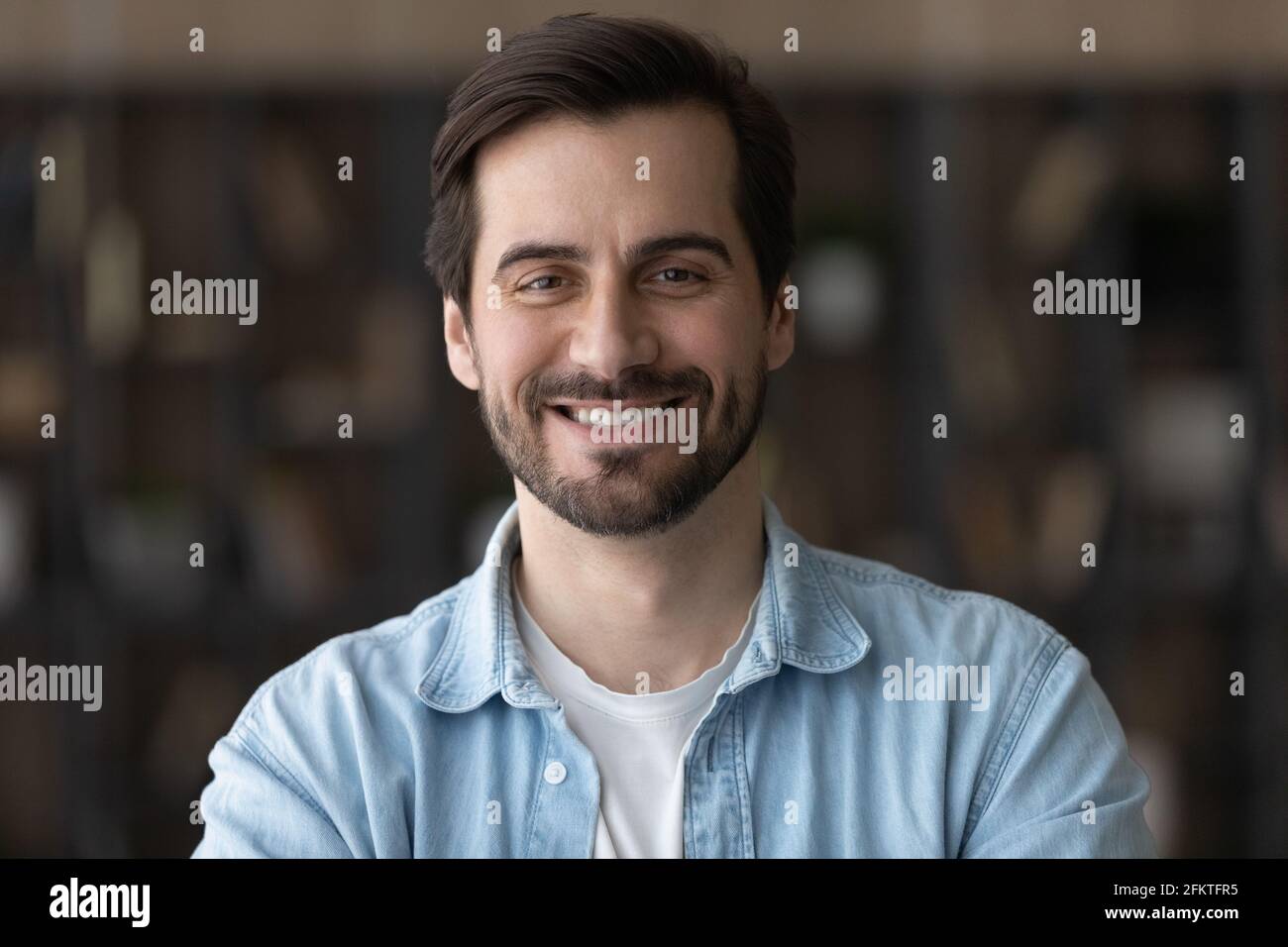 Head shot portrait smiling confident man looking at camera Stock Photo