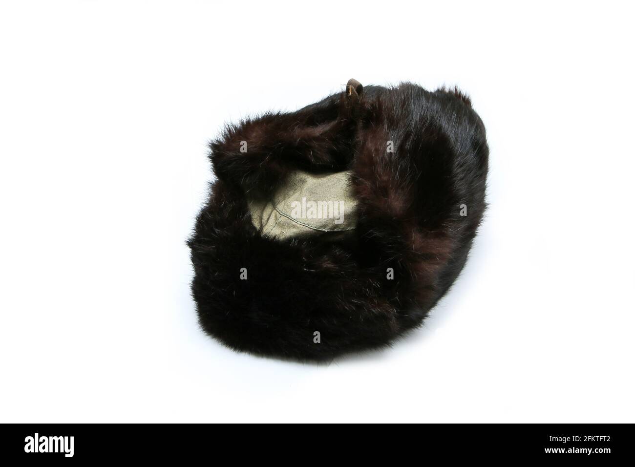 The old unused socialist fur hat isolated on a white background. Stock Photo