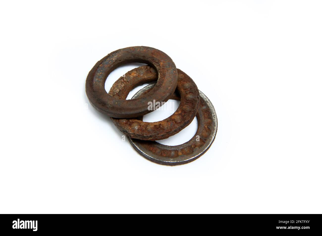 The old broken bearing, with the balls completely overgrown by rust. Disintegrated into three