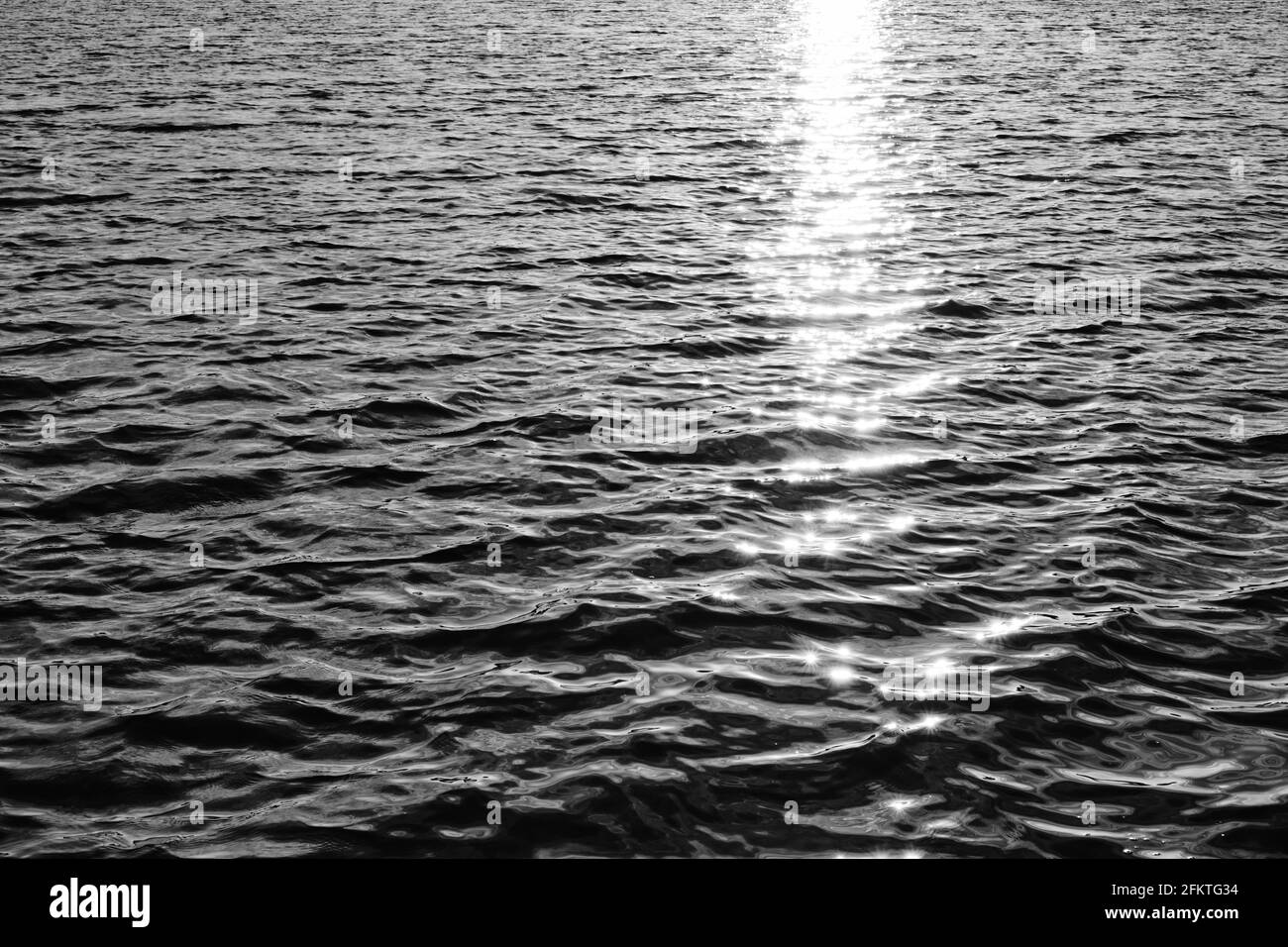 Sunlight reflected on sea Black and White Stock Photos & Images - Alamy