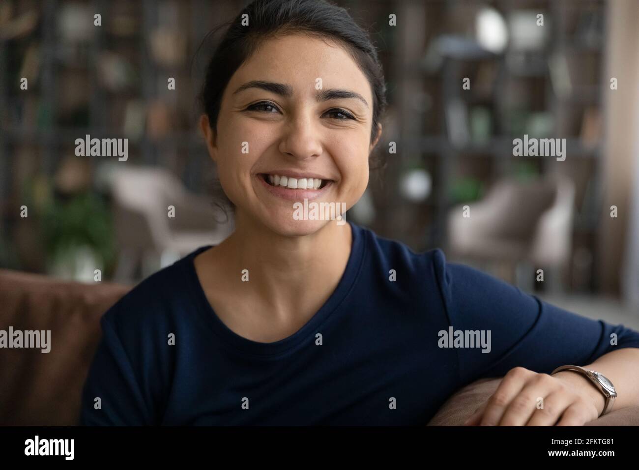 Head shot portrait smiling Indian woman making video call Stock Photo ...