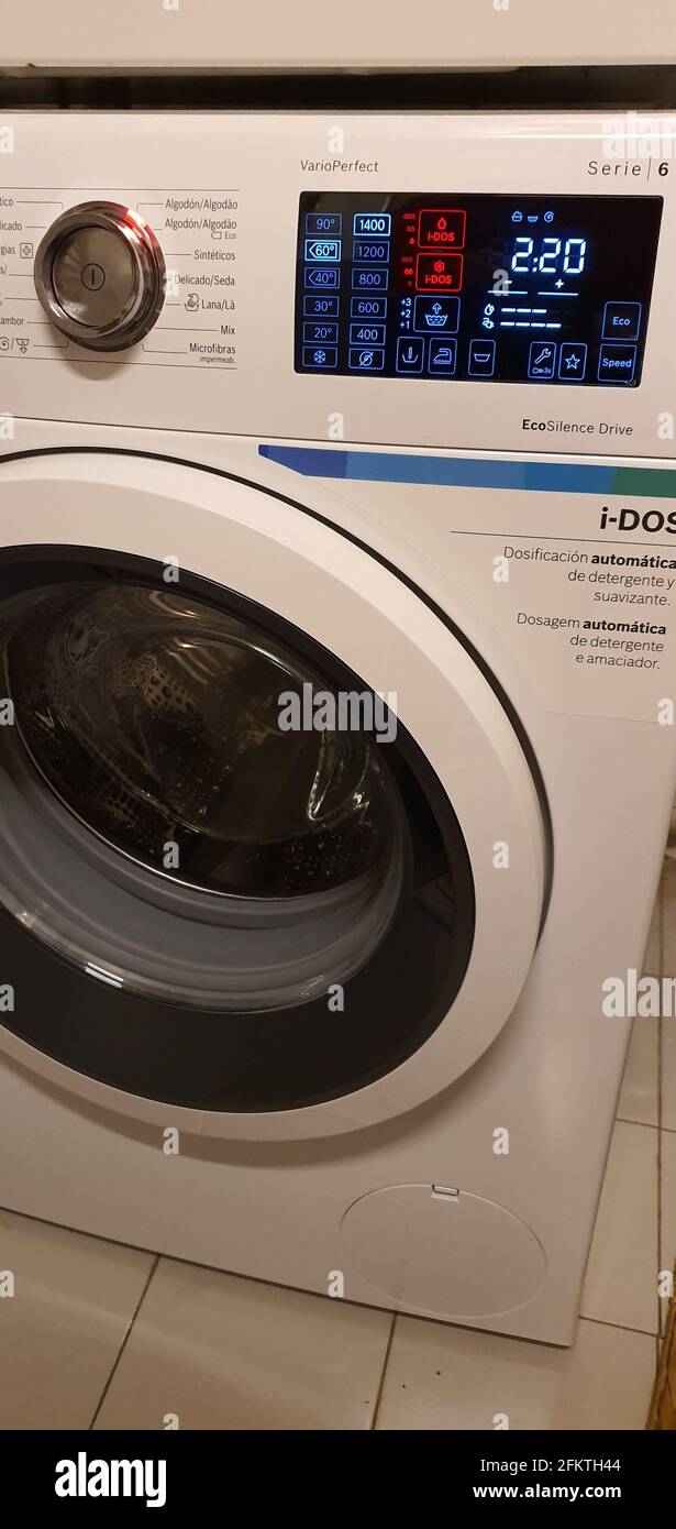 Meet the newest washing machine features. As technology advances, so do washing machines. You may notice some more advanced machines on the market Stock Photo