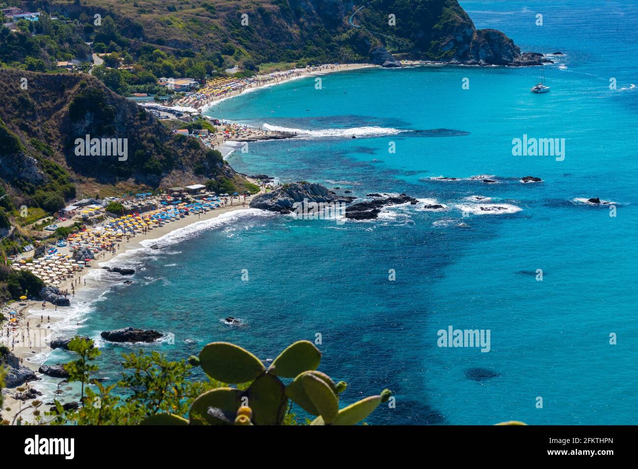 Rock cliff of cape Capo Vaticano with Aeolian Islands, Tyrrhenian Sea