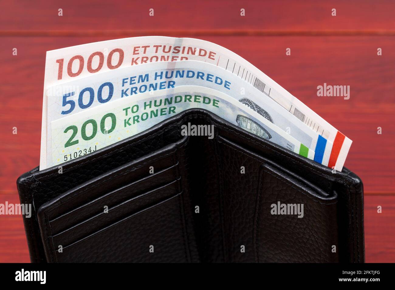 Danish krone in the black wallet Stock Photo