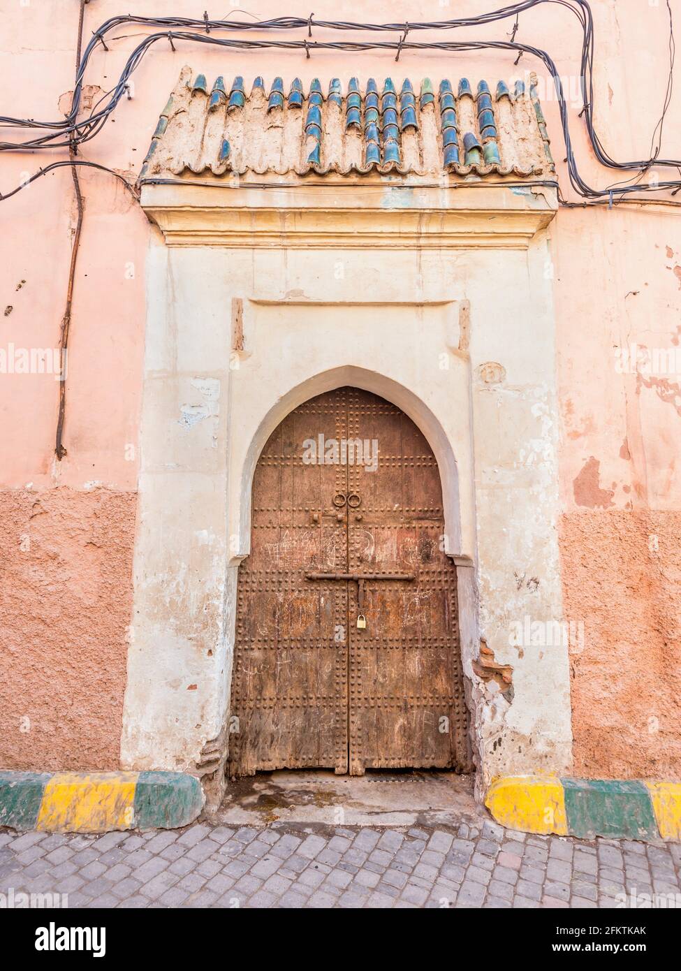 Old wooden door in Marrakech, Morocco. Stock Photo