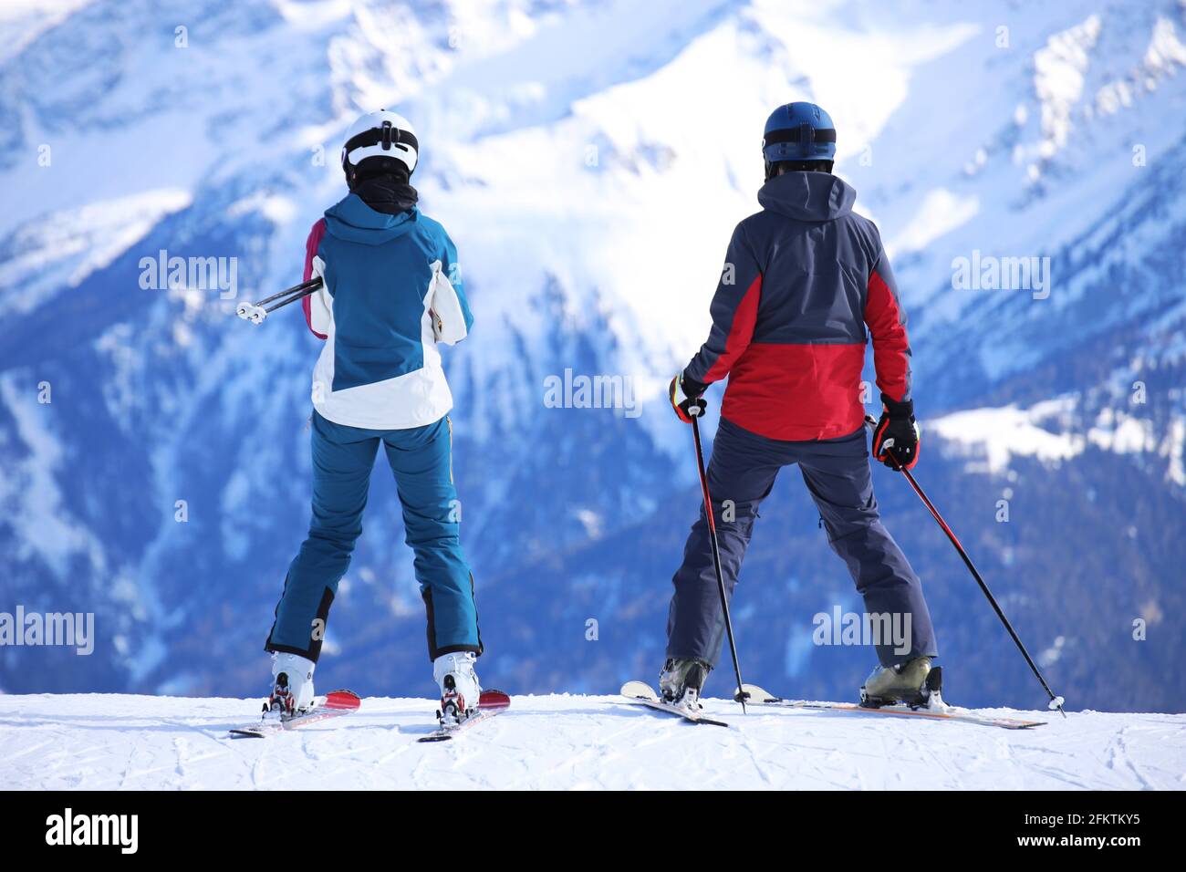 Two skiers enjoy the view. Stock Photo