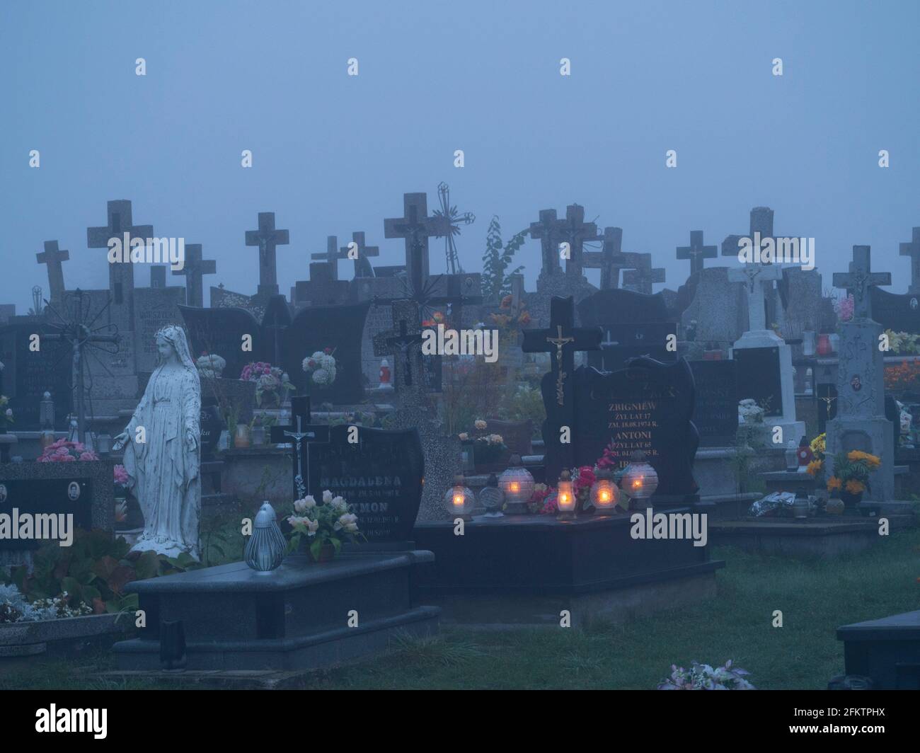 Poland. Cemetery at dawn Stock Photo