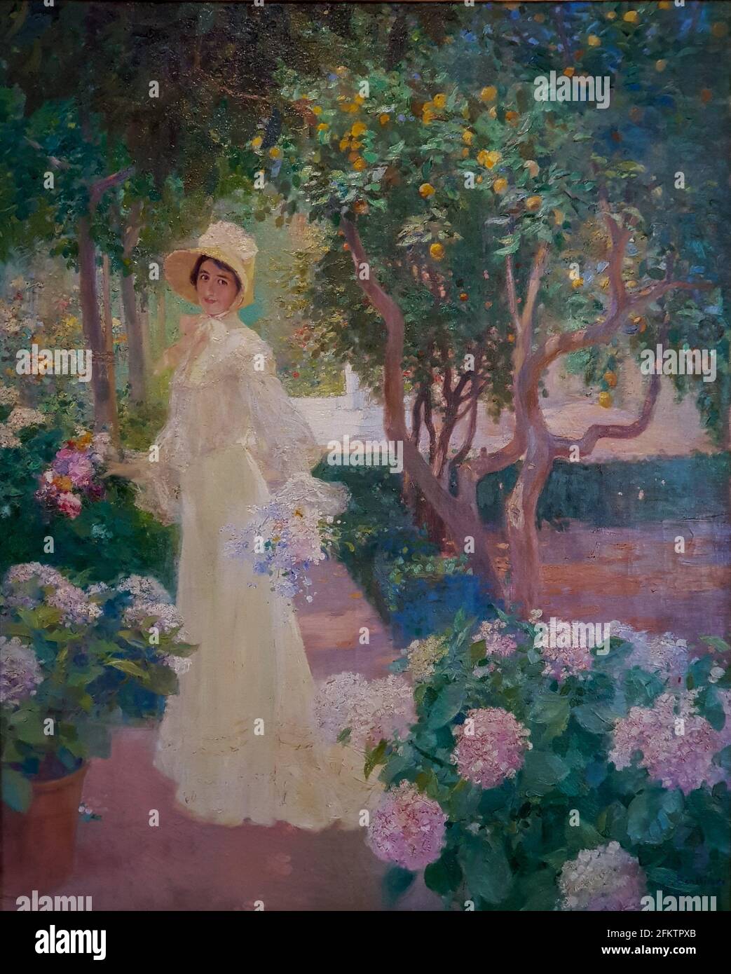 José Benlliure Gil (1856-1937). My daughter in the garden ca. 1920. Oil on canvas. Stock Photo