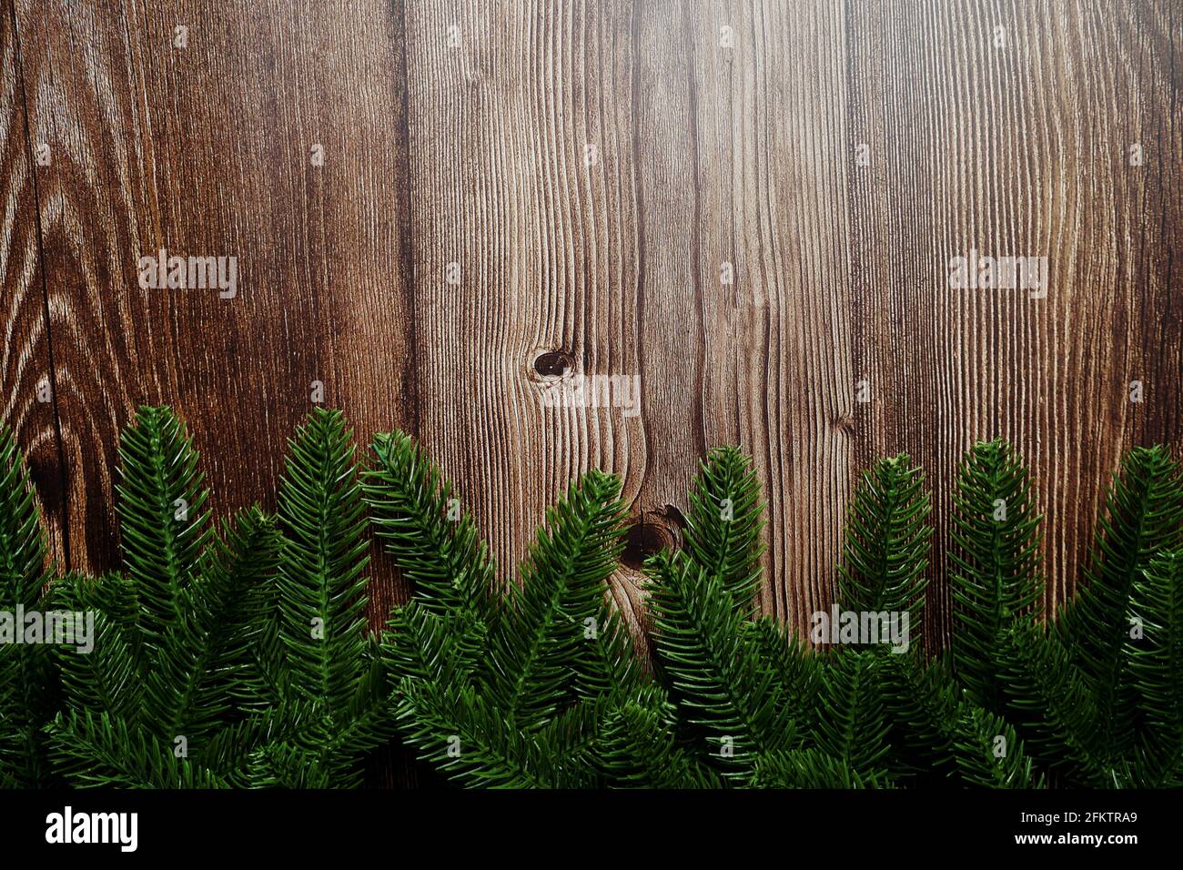 Christmas background with fir tree branches border frame on wooden ...
