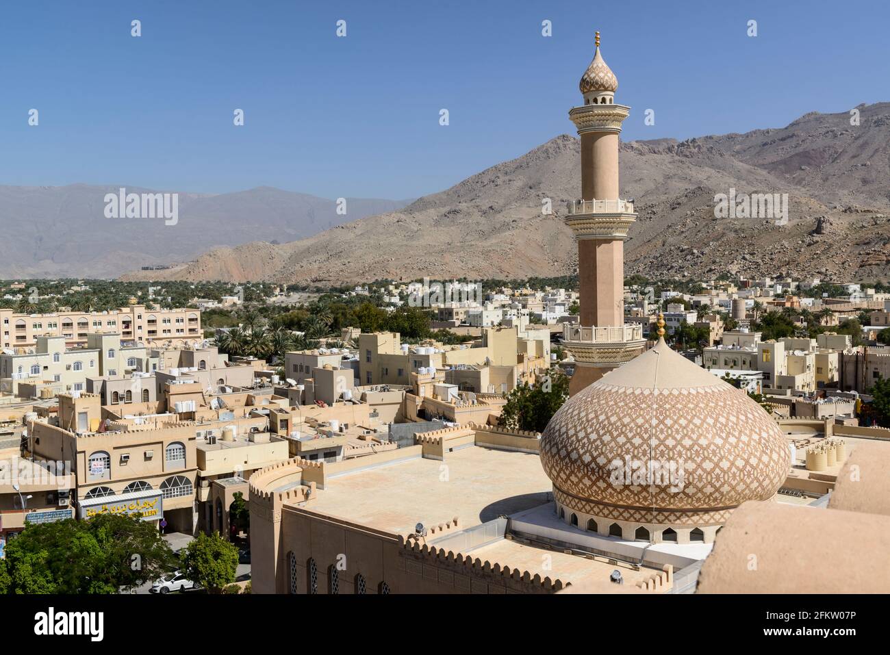 The Al Qala'a Mosque seen from the Nizwa Fort. Ad Dakhiliyah Region, Oman Stock Photo