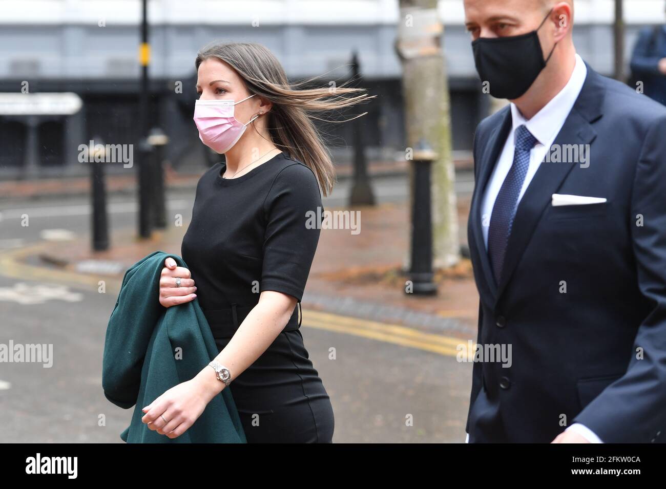 West Mercia Police Constables Benjamin Monk (right) and Mary Ellen  Bettley-Smith (left) arrive at Birmingham Crown Court to stand trial. Monk  is accused of the murder, and an alternative charge of manslaughter,