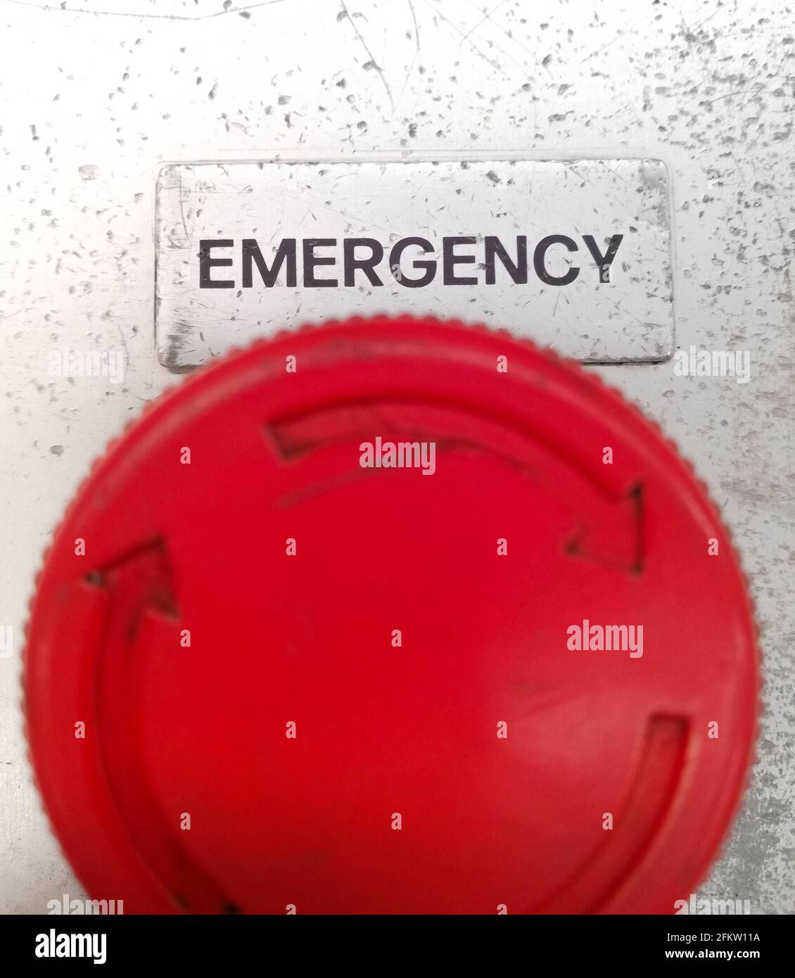 Closeup shot of a red emergency button which is used to stop the ...