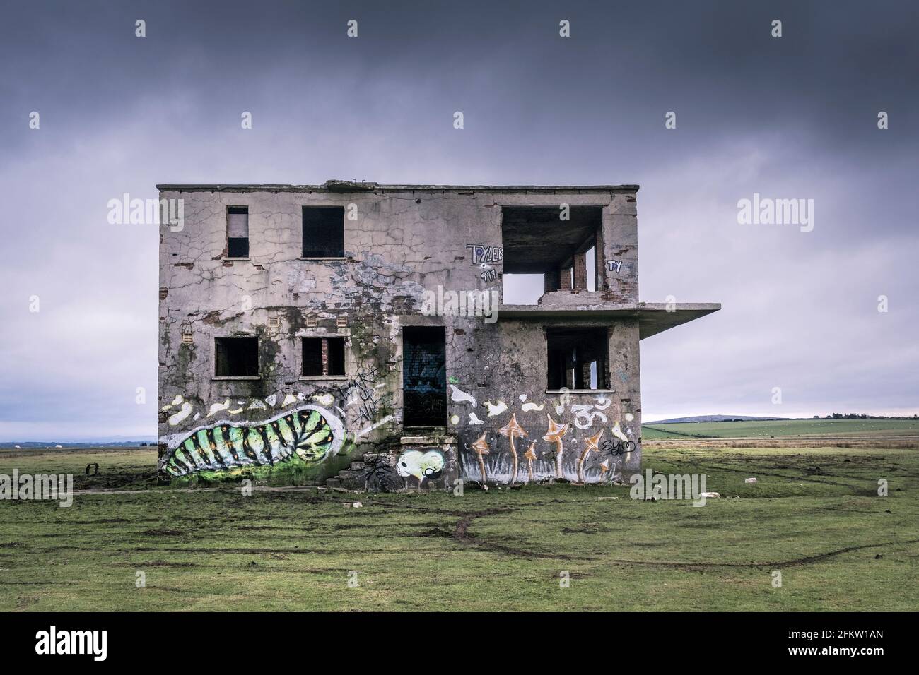 The derelict and abandoned control tower on the disused WW2 RAF Davidstow Airfield on Bodmin Moor in Cornwall. Stock Photo
