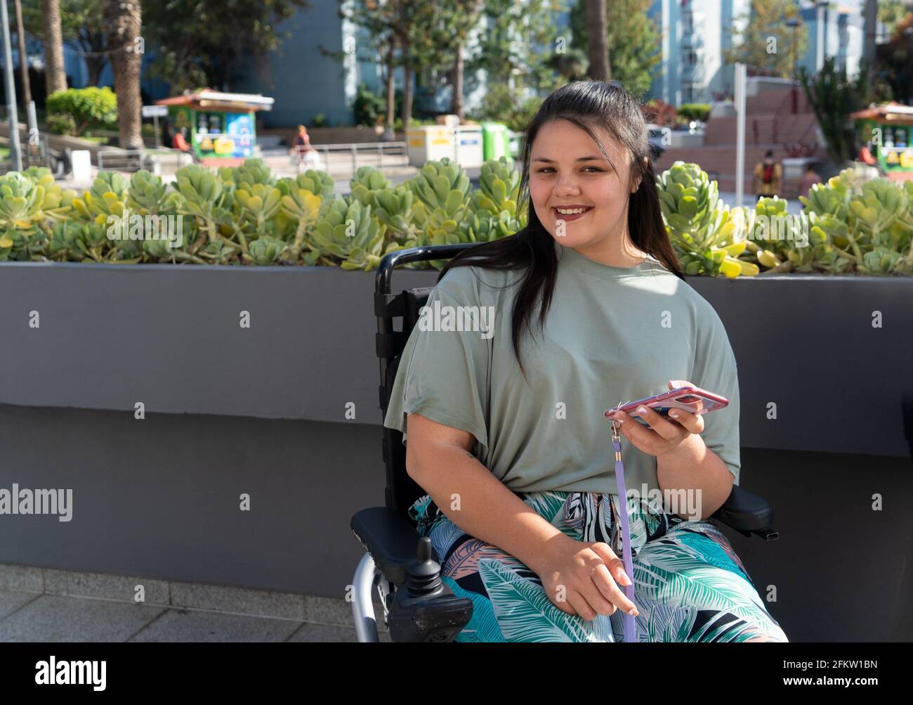 disabled young woman in wheelchair Stock Photo - Alamy