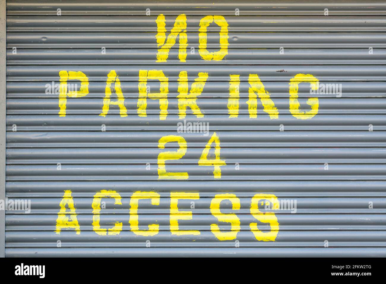 No Parking sign on a garage door, UK Stock Photo
