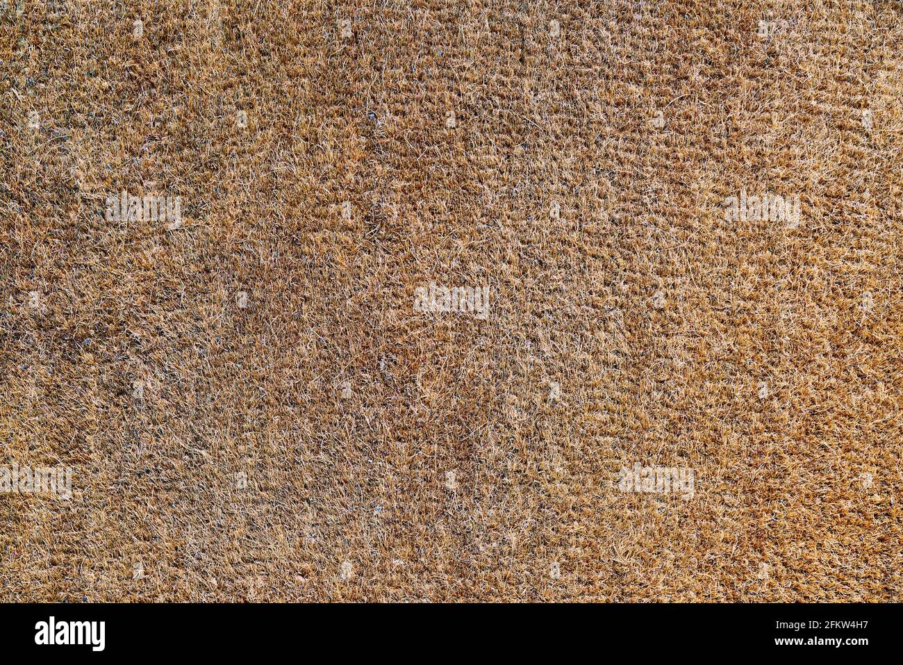 The Texture of an Old and Worn Coir Doormat Stock Photo