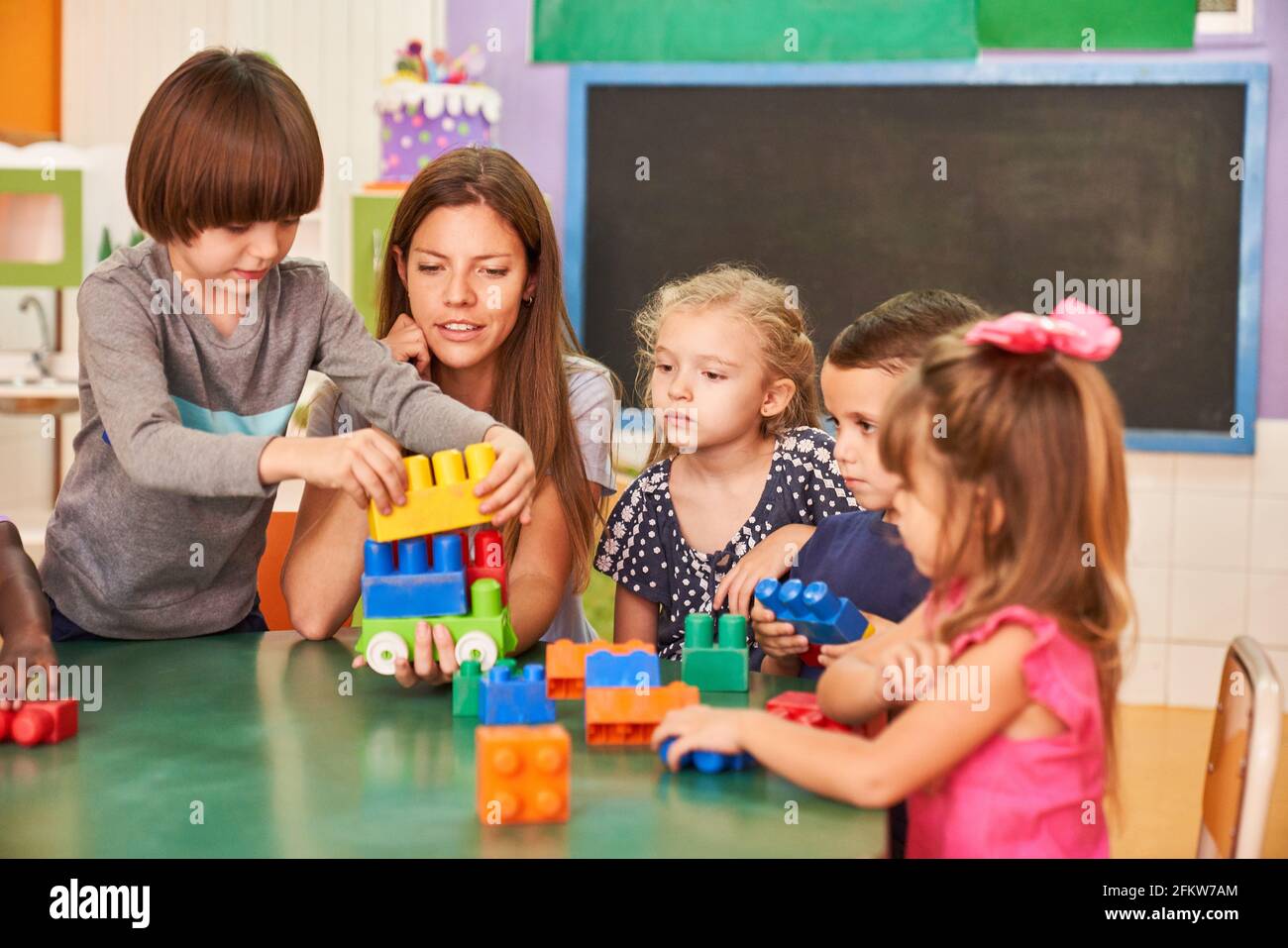 Nursery school children at play hi-res stock photography and images - Alamy