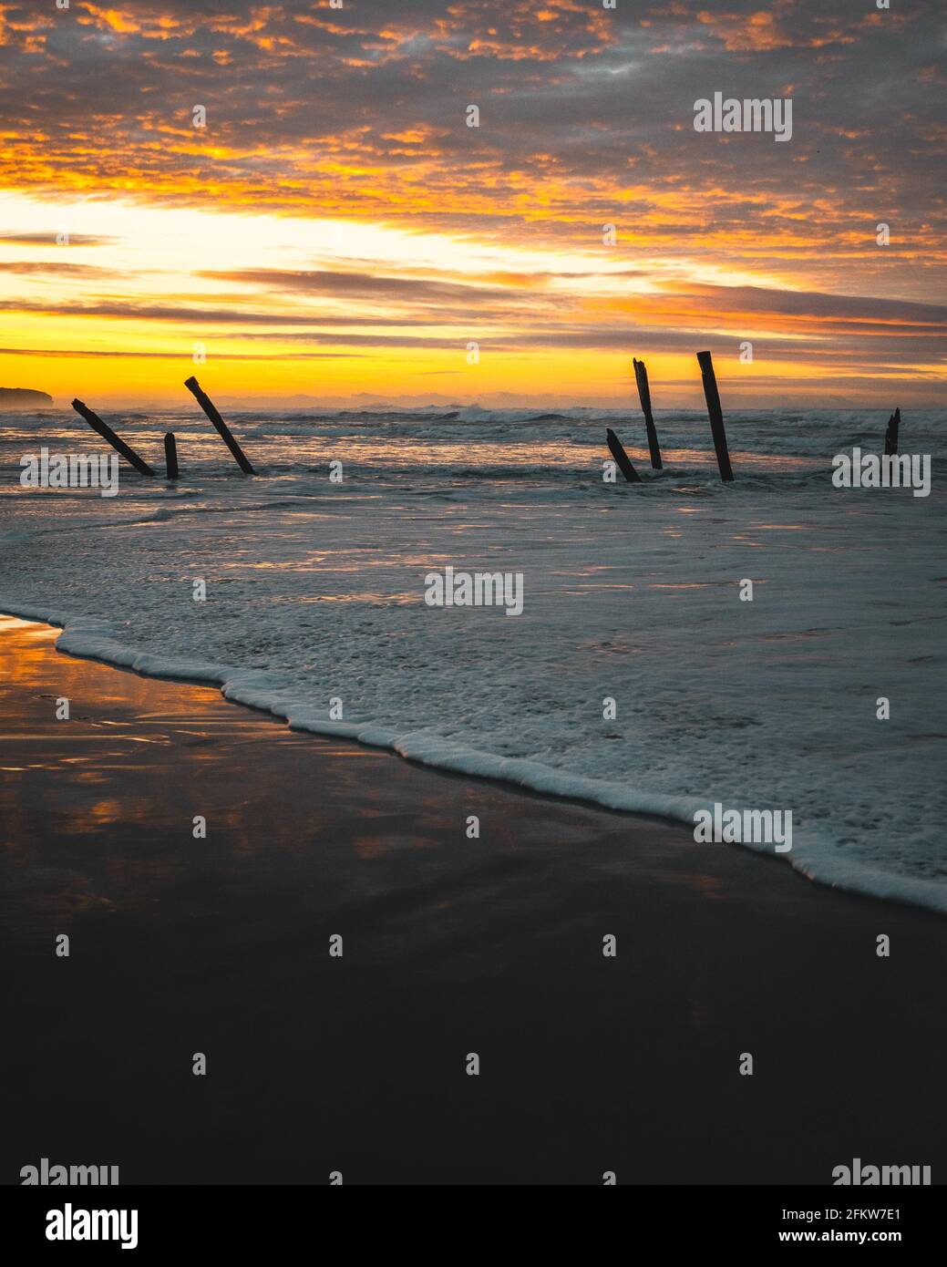 Beautiful view at the golden sunset on the beach Stock Photo - Alamy