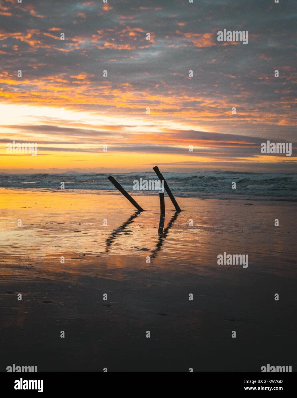 Beautiful view at the golden sunset on the beach Stock Photo - Alamy