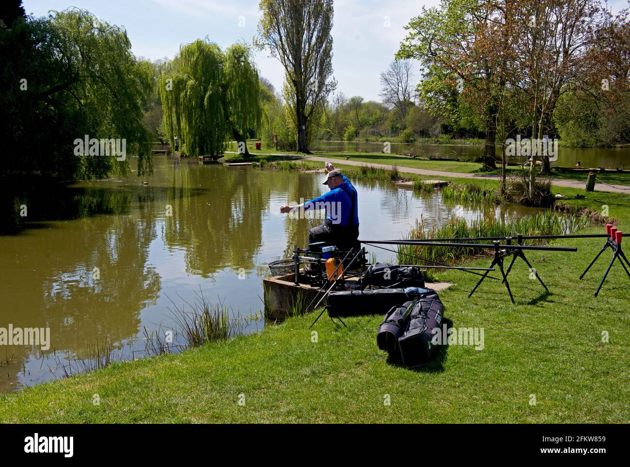 Angler at the Delves fishing lake, Thorne, South Yorkshire, England UK Stock Photo
