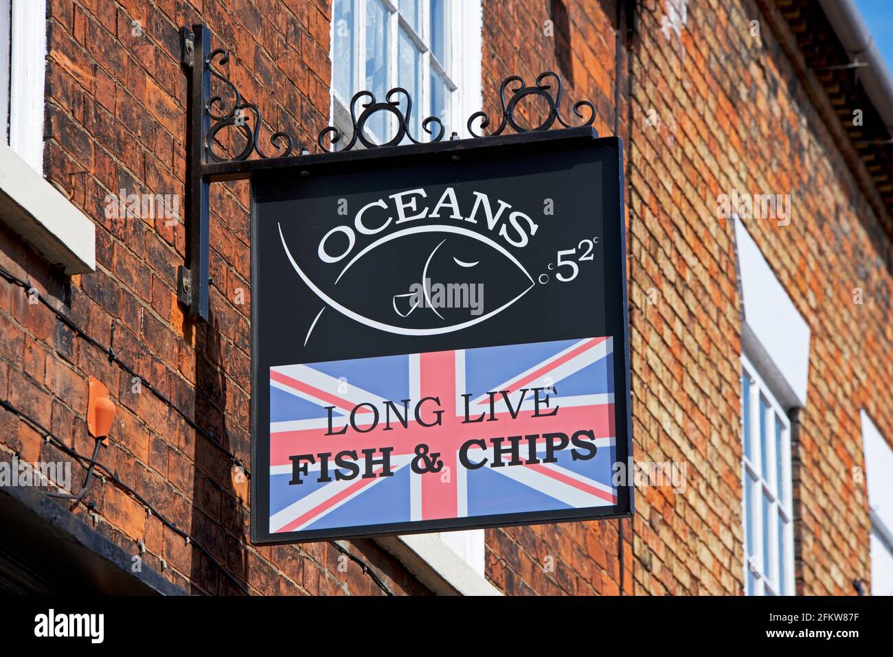 Sign - long live fish & chips - above fish & chip shop, England UK Stock Photo