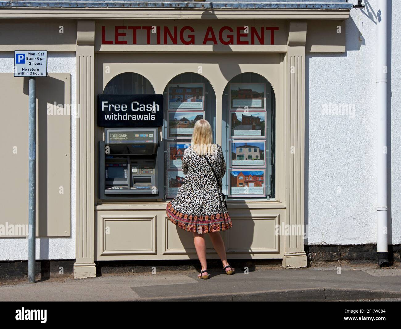 Letting agent and cash machine, England UK Stock Photo