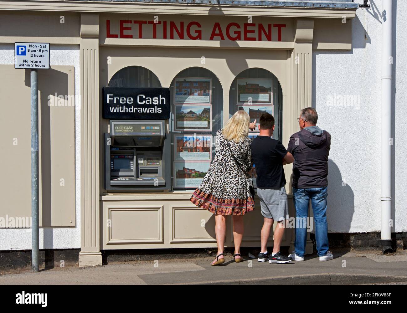 Letting agent and cash machine, England UK Stock Photo