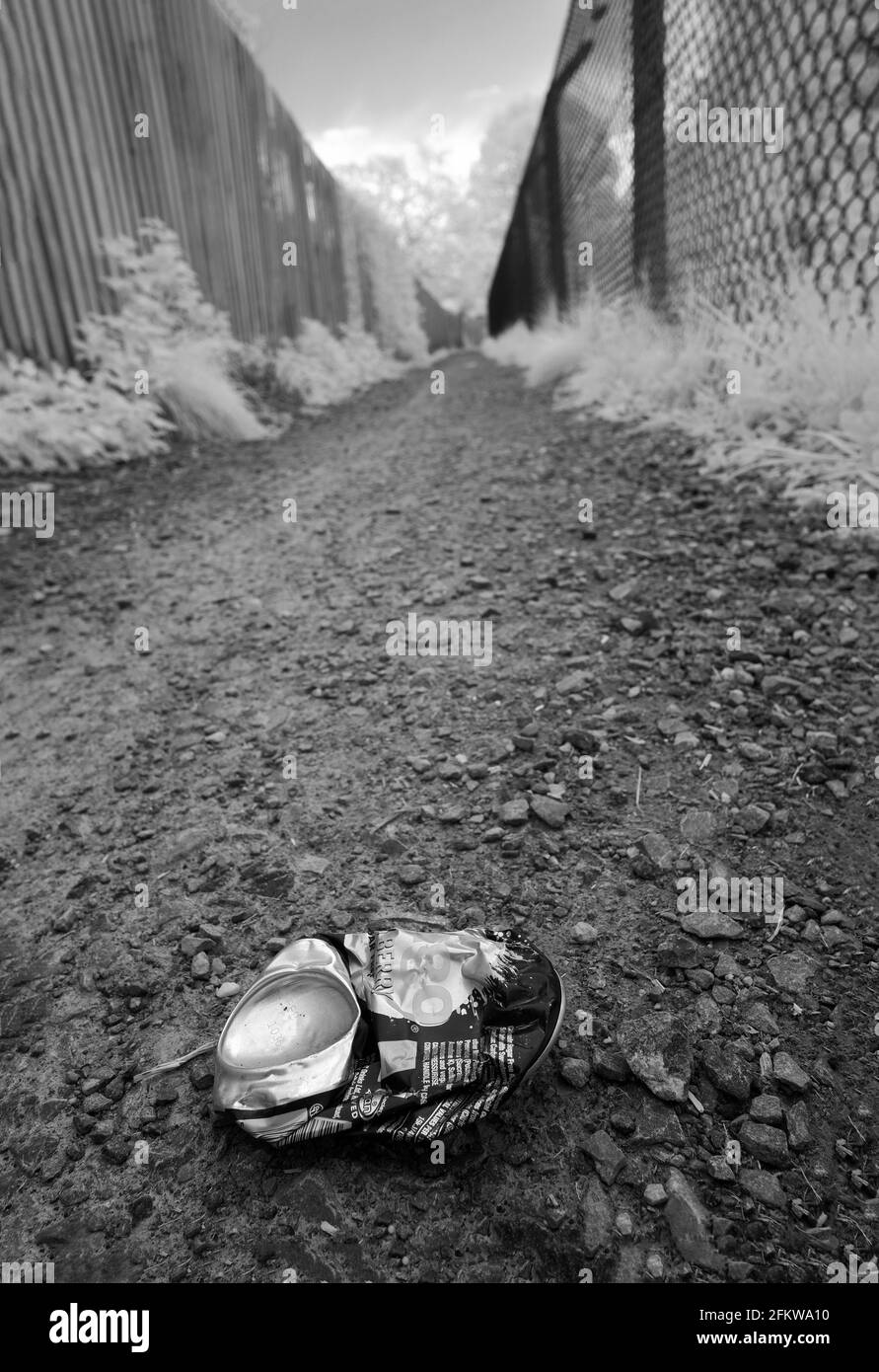 May 2021 - 720nm Infrared - Abandoned drinks can on the cycle track in Cheddar, Somerset, England, UK. NCN 26. Stock Photo