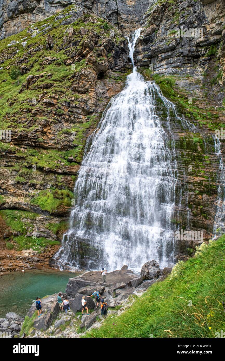 Cola de Caballo waterfall in Ordesa y Monte Perdido National Park, Huesca, Aragon, Spain, Pyrenees mountains. Karst limestone peaks within Ordesa and Stock Photo