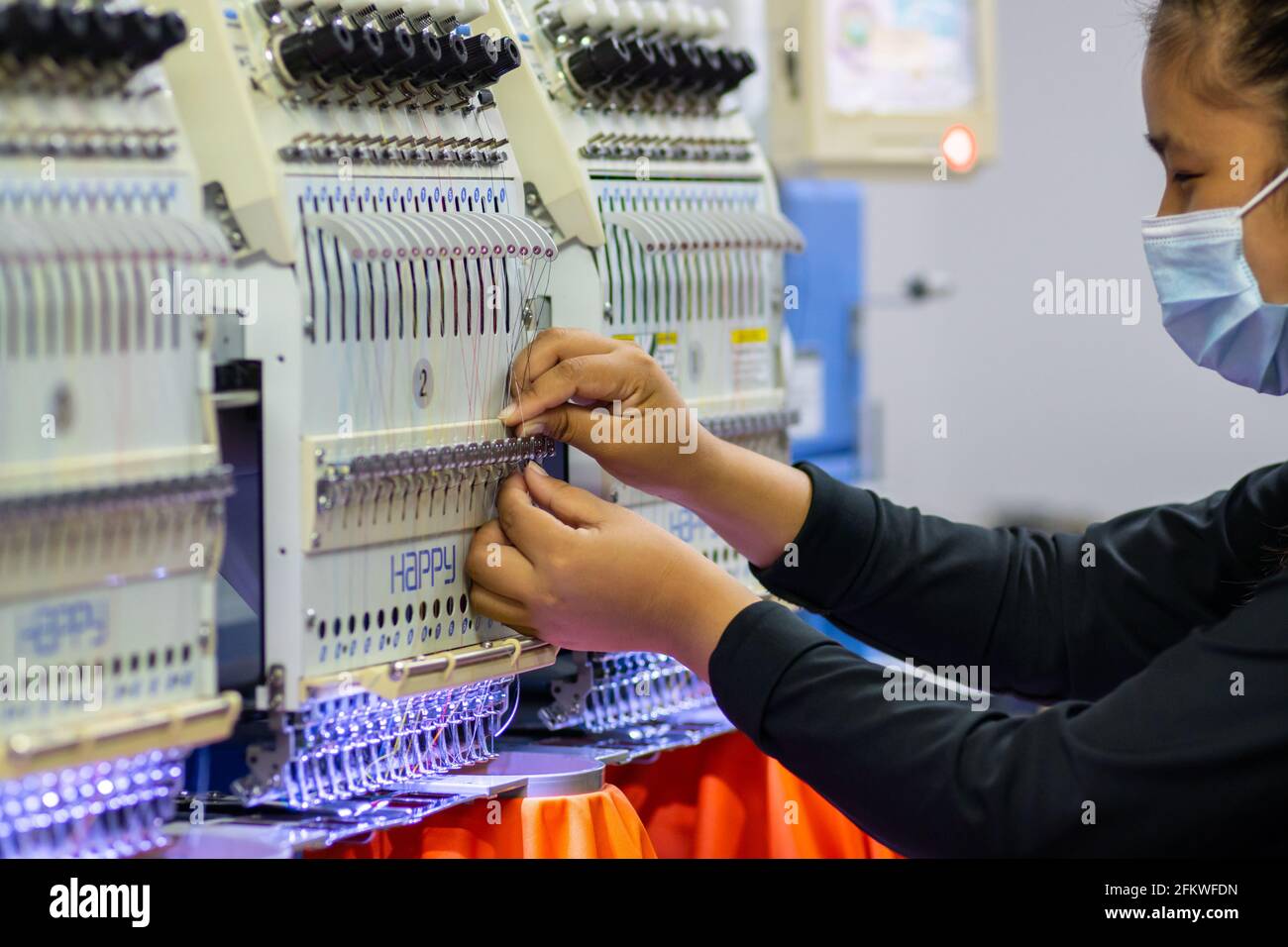 Kota Kinabalu, Sabah, MalaysiaMarch 05, 2021 Female work with face